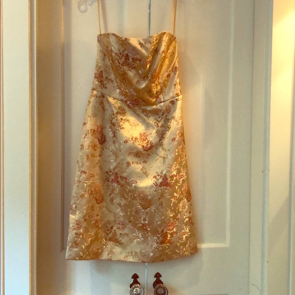 Beautiful gold dress in oriental jacquard print